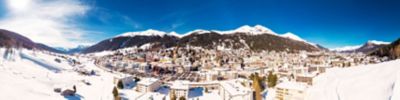 DAVOS, SWITZERLAND - Januar, 23, 2019 - Aerial view of Davos city with ski slopes in the Winter, Grisons, Switzerland